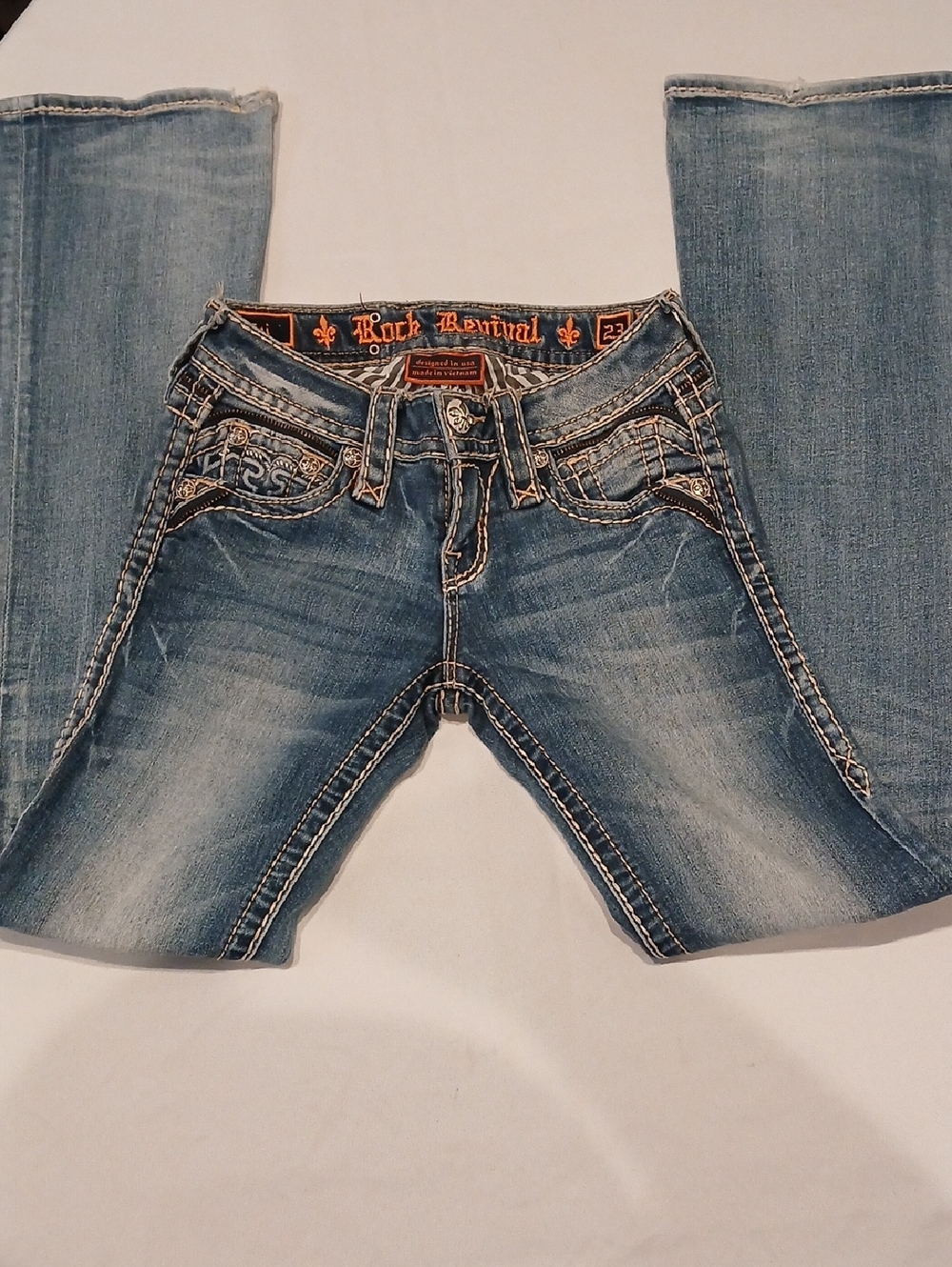 Rock Revival faded light blue embroidered pocket jeans